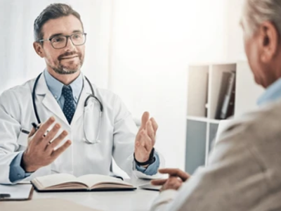 Professional surgeon smiling confidently in a medical environment